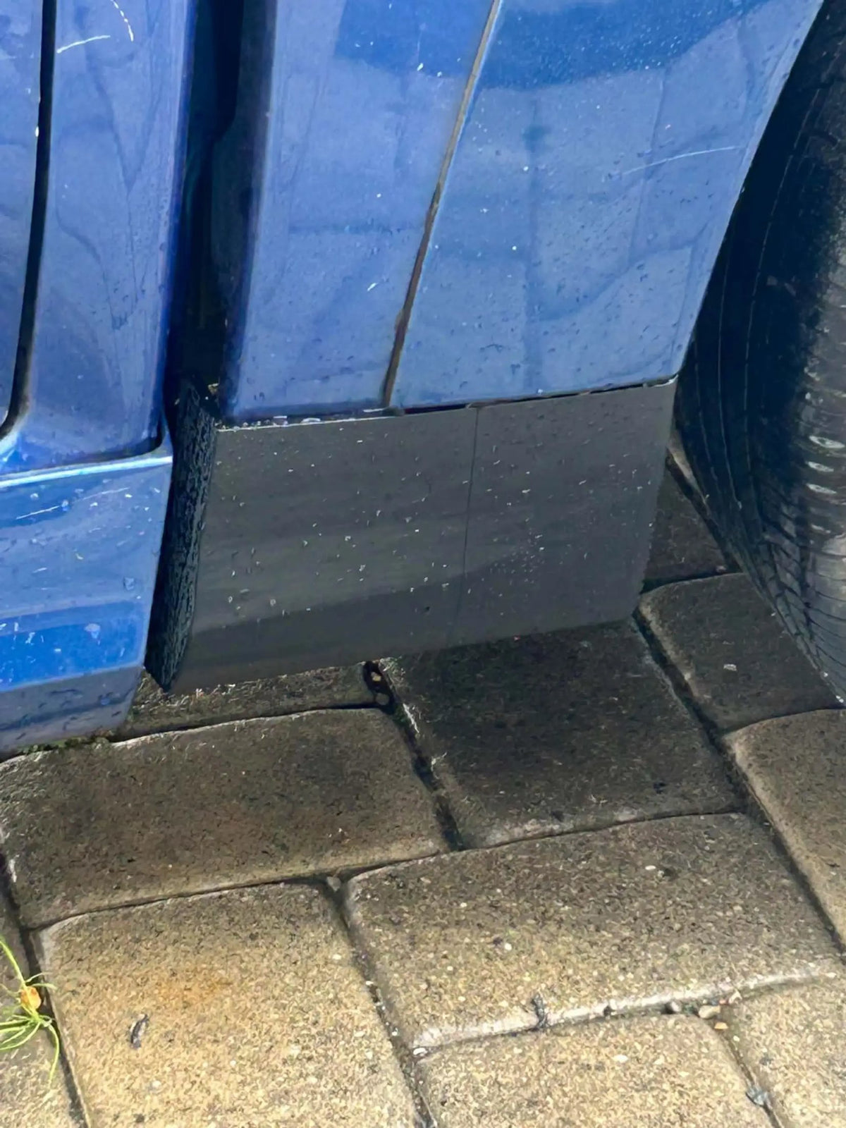 The printed trim piece installed on the car, sitting flush with the panels around it