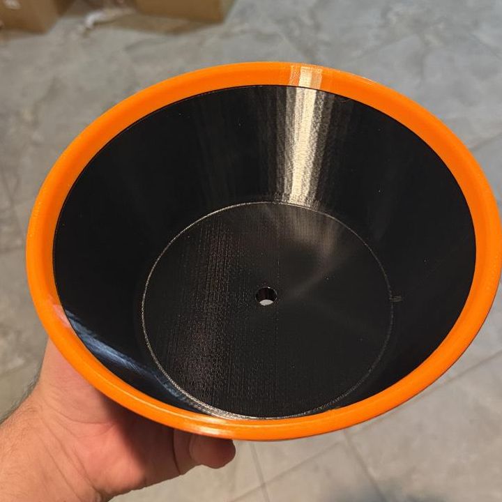 Black PETG bowl with an orange TPU rim, for polishing bowling balls