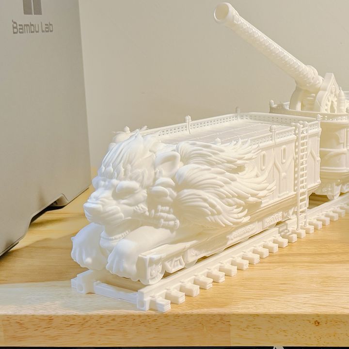 White PLA print of an armoured war train with a lion-head engine and a mounted cannon